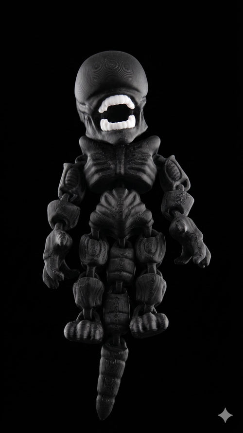 Full 3D printed Xenomorph flexi figure with white inner jaw detail standing upright on a black background as the main product view