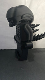 Left side profile view of the oversized Alien Xenomorph brick collectible