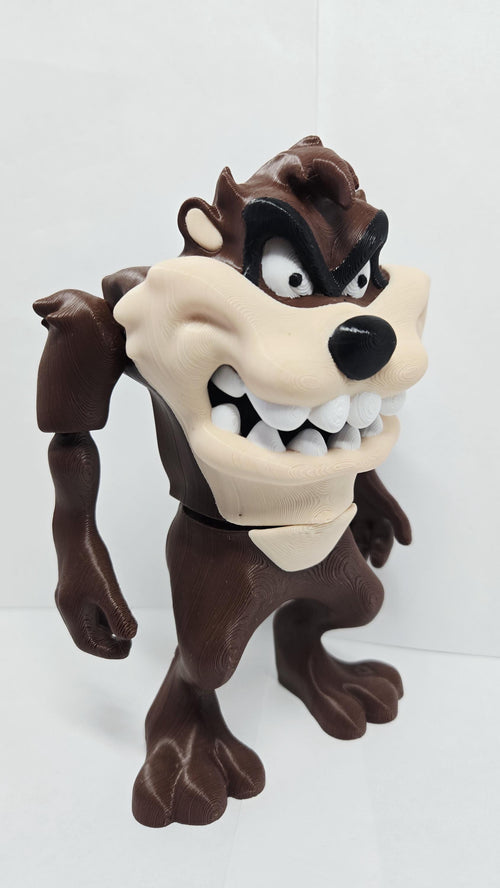 Right side view of the Taz flexi figure bended backward to demonstrate the flexible movement of the jointed segments