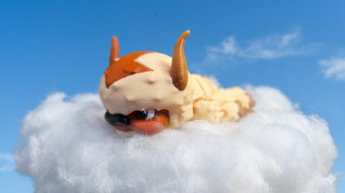 Full-color 3D printed Appa flexi figure from Avatar: The Last Airbender displayed flying on a cloud