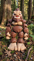 Full-color 3D printed Bigfoot Sasquatch flexi figure standing upright on a flat surface showing a complete front view