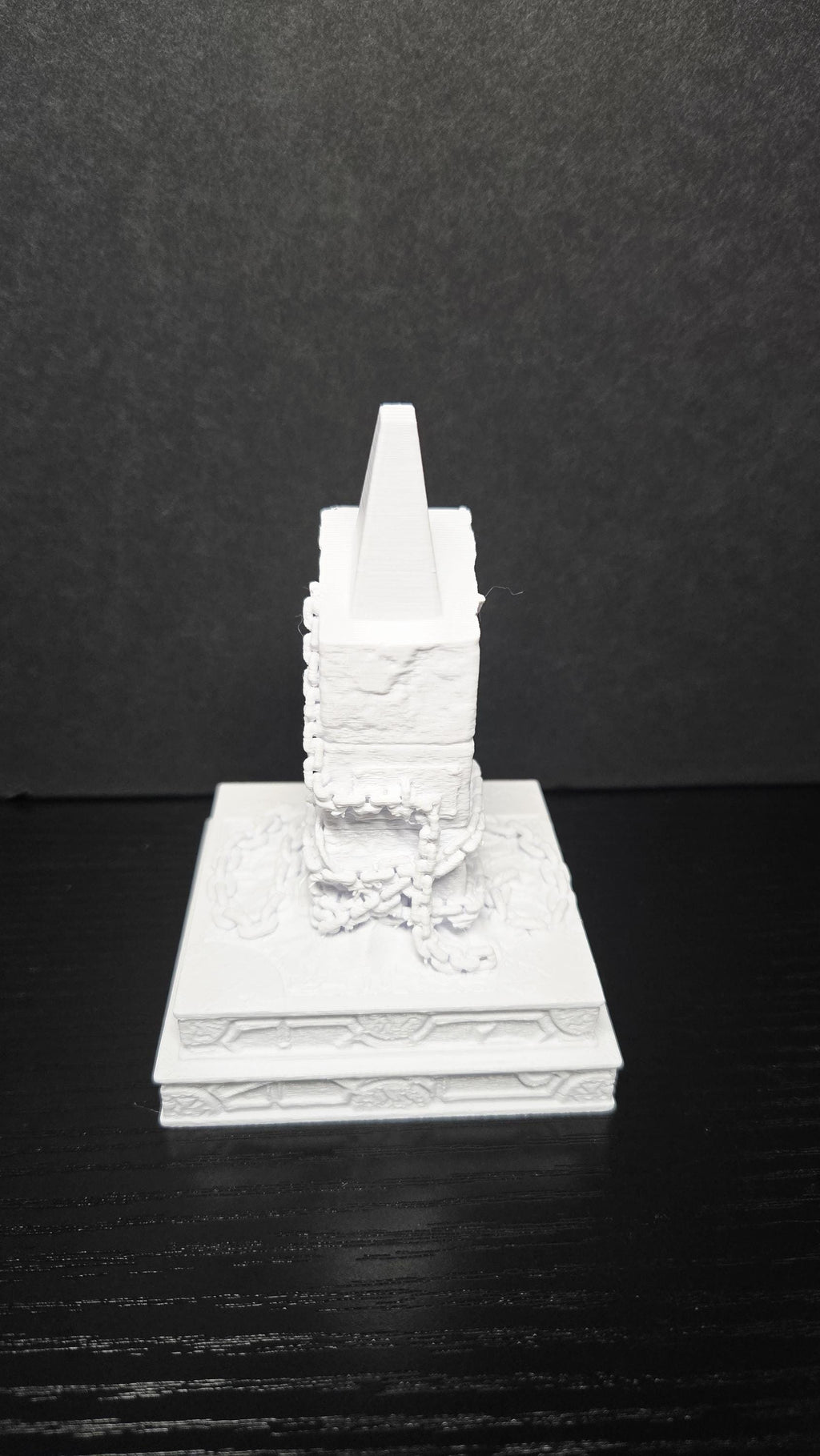 Front view of the unpainted 3D printed pedestal display base for the Chatterer Cenobite bust
