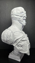 Three-quarter right side view of the unpainted Chatterer bust highlighting the leather armor texture and head detail