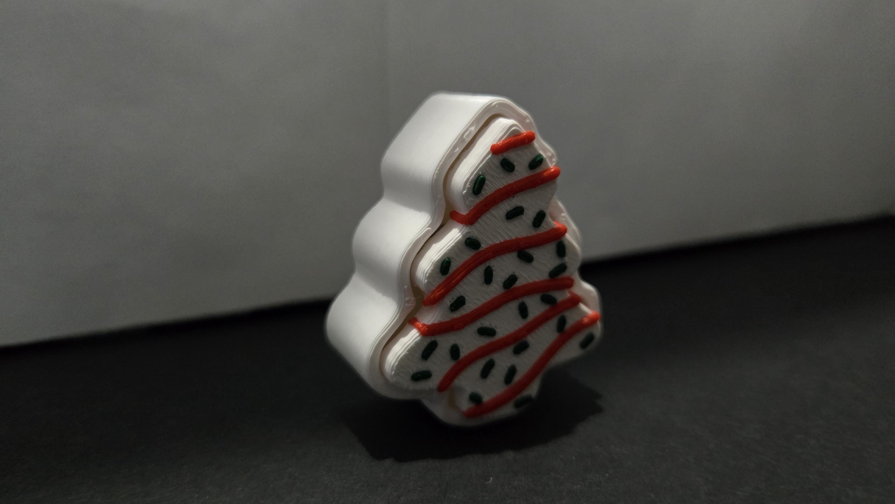 Side profile view of the 3D printed Christmas tree snack cake fidget toy