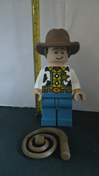 Measuring tape showing the towering height of the scaled oversized cowboy sheriff megafig