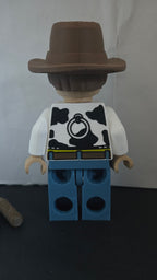 Rear view of the oversized cowboy sheriff brick megafig showing back vest details and studs