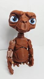 Full-color 3D printed E.T. the Extra-Terrestrial flexi figure standing upright on a flat surface showing a complete front view