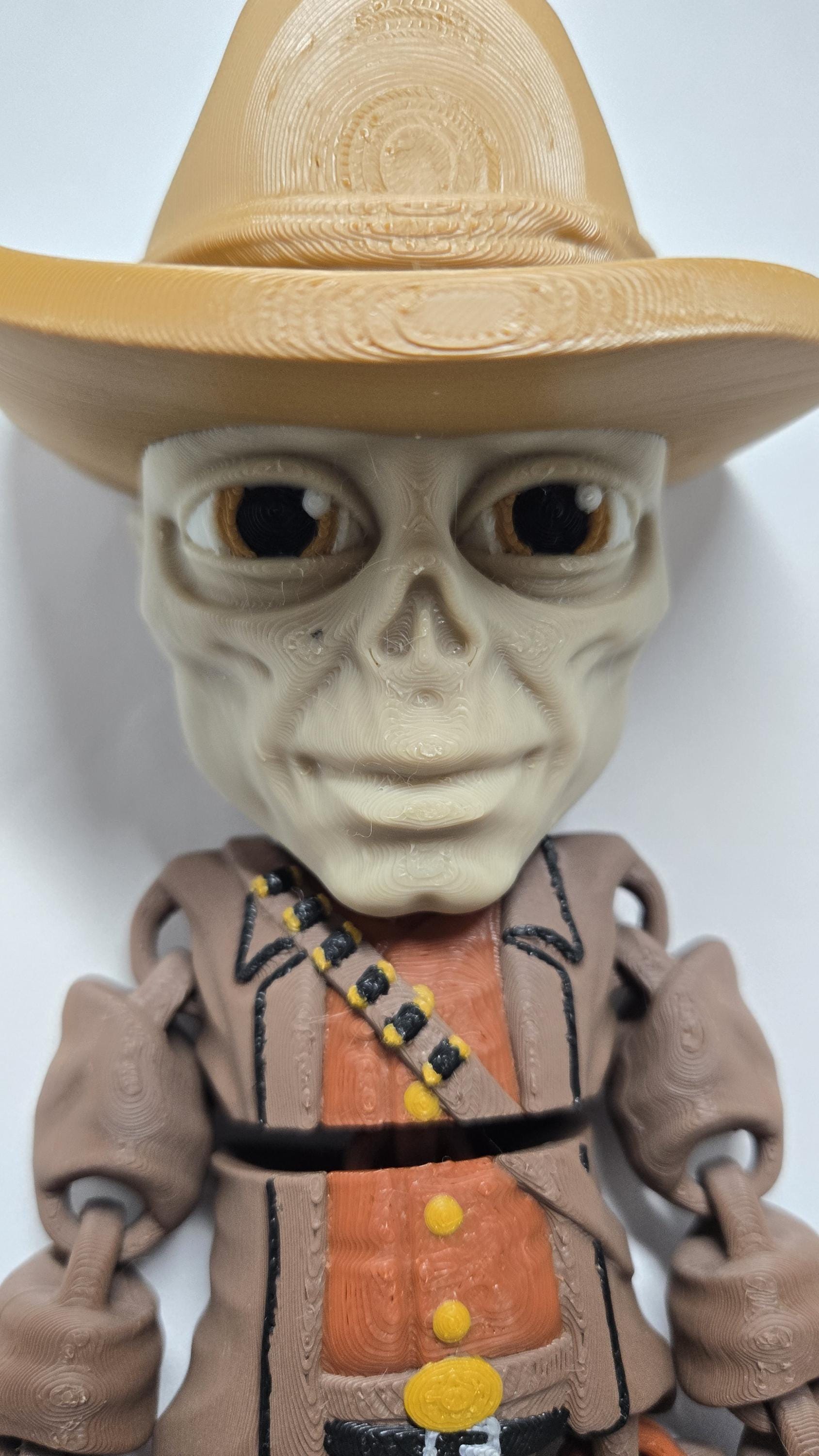 Straight front-on view focusing on the detailed cowboy hat, weathered face, and wasteland gear of the flexible Ghoul figure