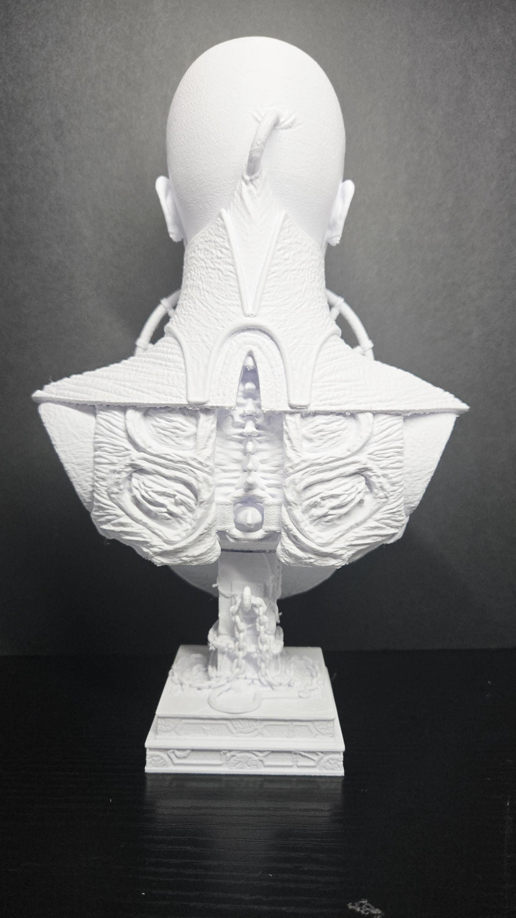 Rear view of the unpainted Female Cenobite bust highlighting the back armor and spinal column details