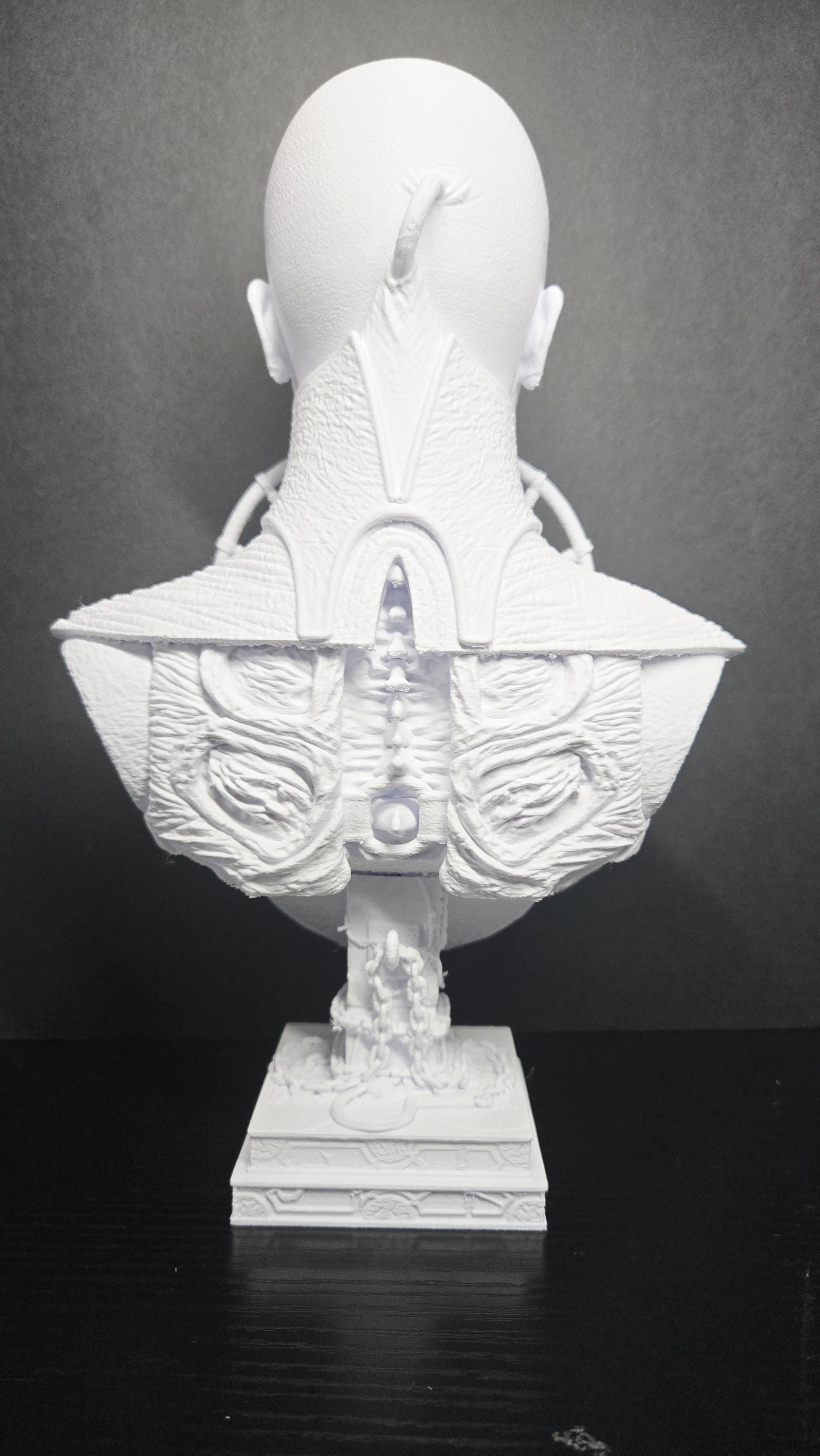 Rear view of the unpainted Female Cenobite bust highlighting the back armor and spinal column details