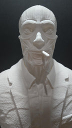 Close-up three-quarters view of the unpainted Frank Cotton bust highlighting the detailed neck musculature and the molded cigarette in his mouth