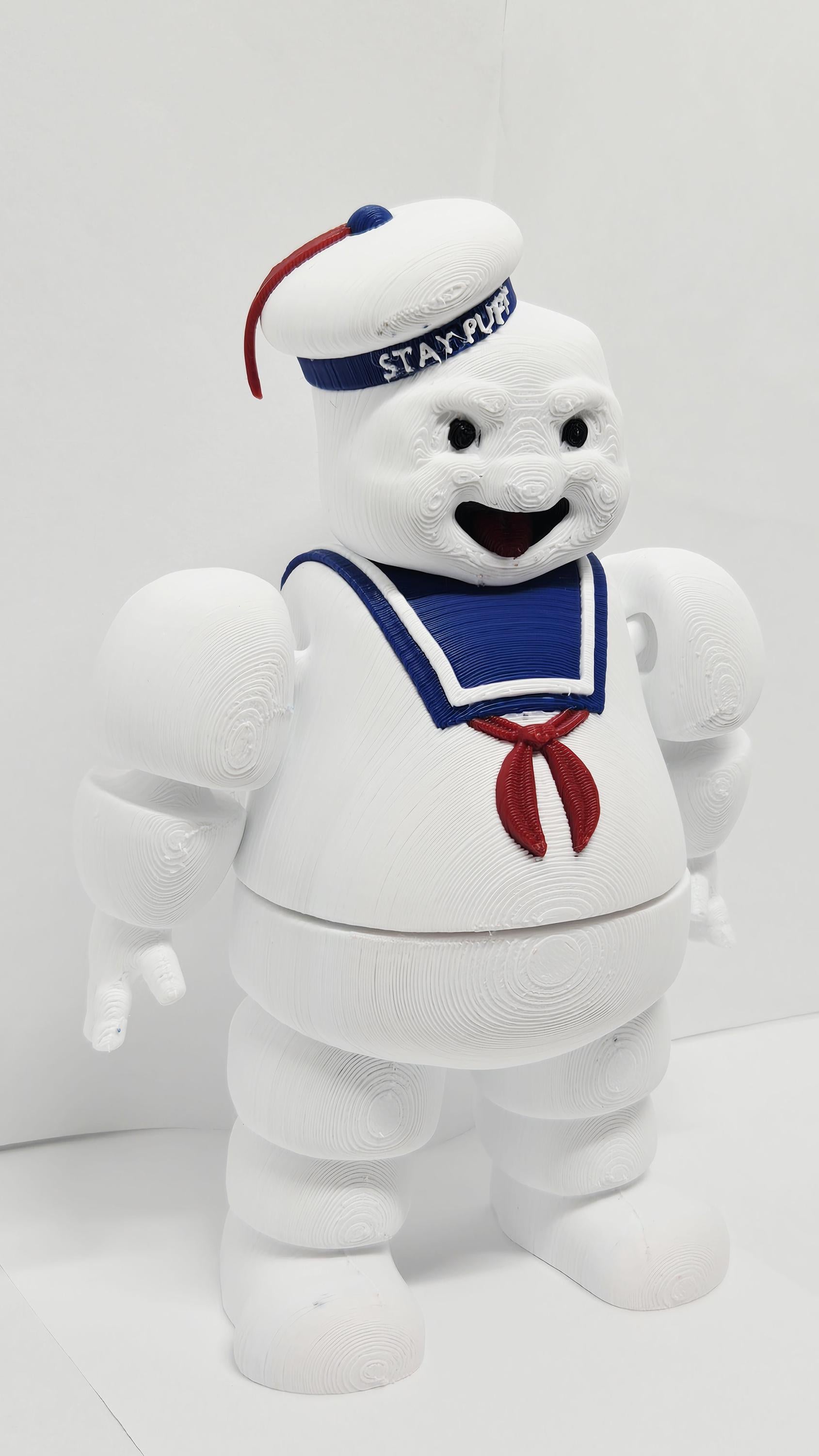 Full-color 3D printed Stay Puft Marshmallow Man flexi figure standing upright on a flat surface showing a complete front view