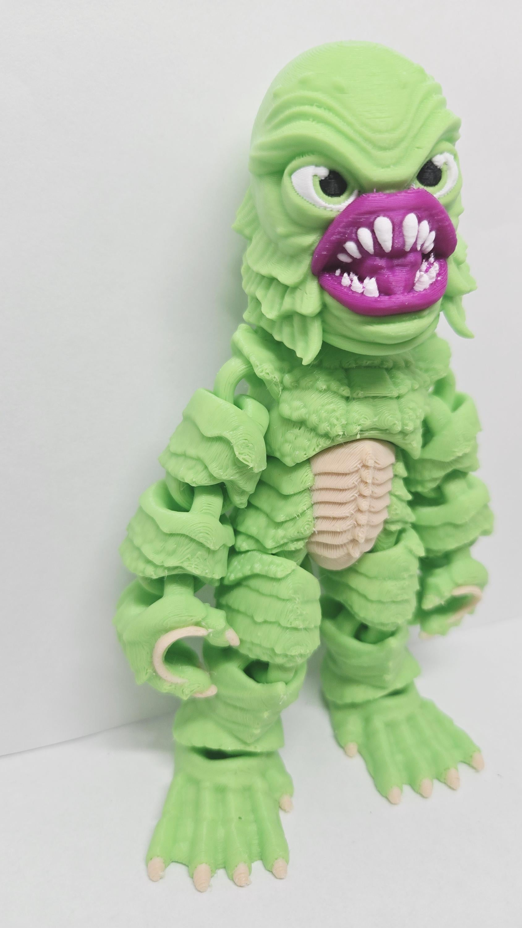 Right side view of the jointed Creature from the Black Lagoon figure slightly flexed to demonstrate the dynamic movement of the parts