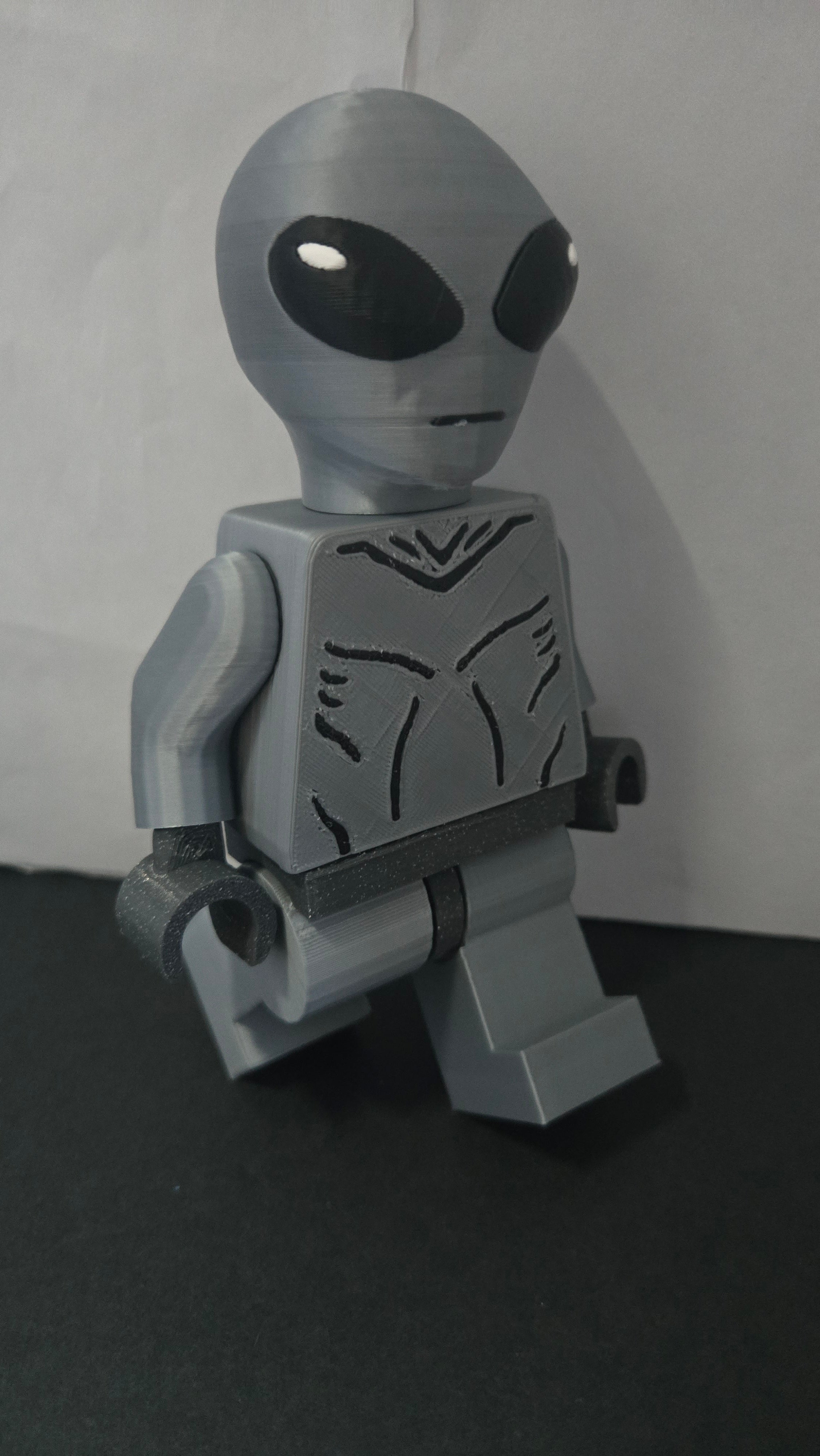 Side profile stride view of the 3D printed Grey Alien megafig