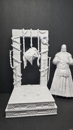 Unpainted 3D printed Cenobite diorama showing the figure separated from the architectural backdrop