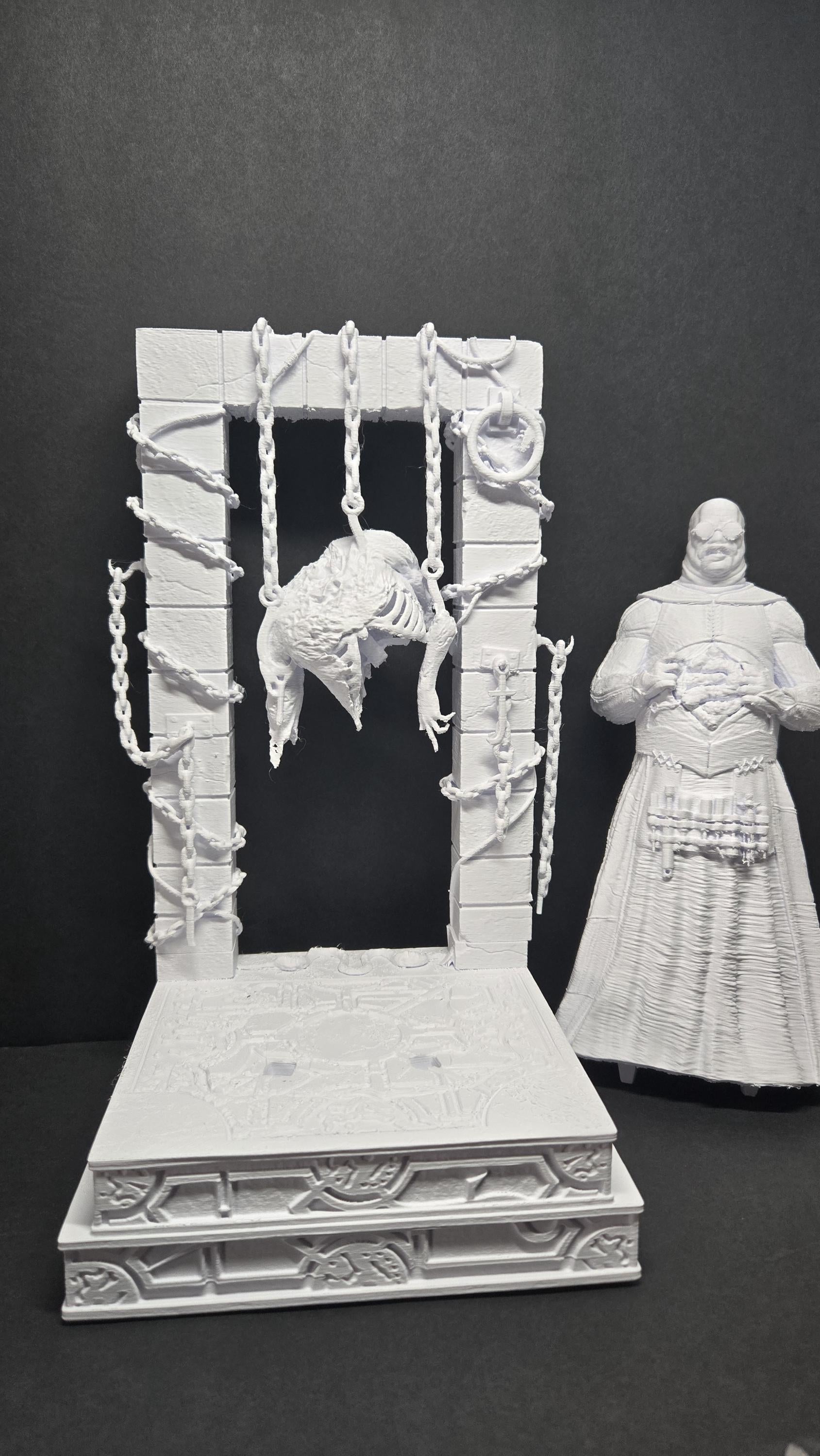 Unpainted 3D printed Cenobite diorama showing the figure separated from the architectural backdrop