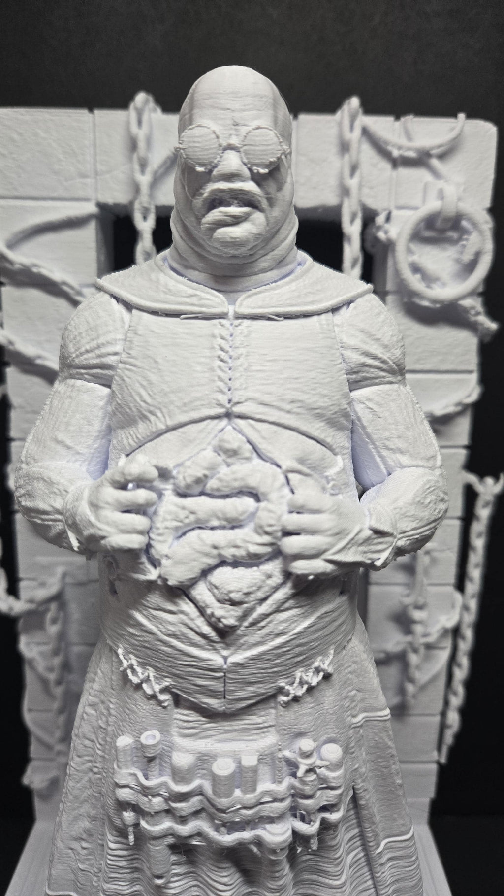 Close-up of the unpainted 3D printed Cenobite torso and robe texture detail