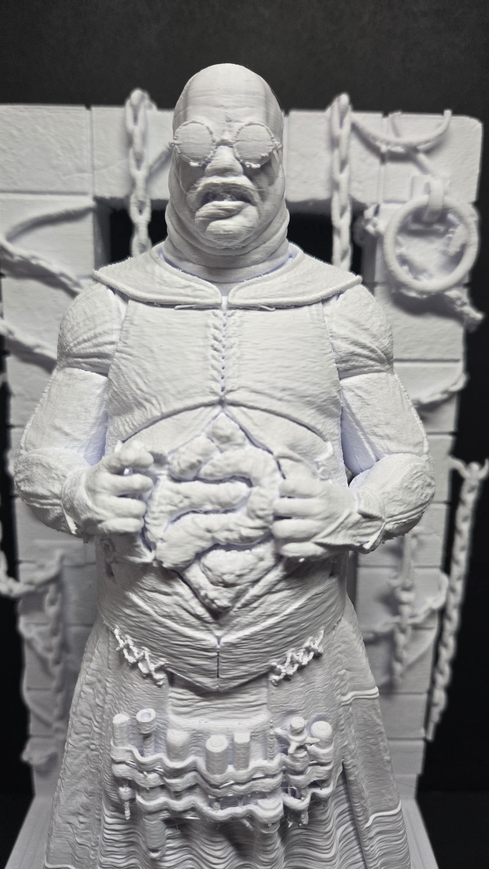 Close-up of the unpainted 3D printed Cenobite torso and robe texture detail