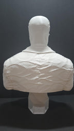 Rear view of the unpainted 3D printed Frank Cotton statue focusing on the smooth head sculpture and the back of the textured suit coat