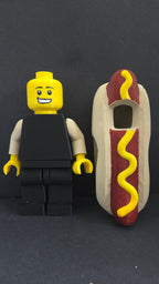 Hot Dog Guy brick megafig standing next to its detachable hot dog bun costume shell