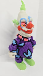 Side profile view of the 3D printed Jumbo flexi figure showing his articulation and suit detail