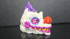 Close-up view of the alternate head sculpt for the Klownzilla flexi figure