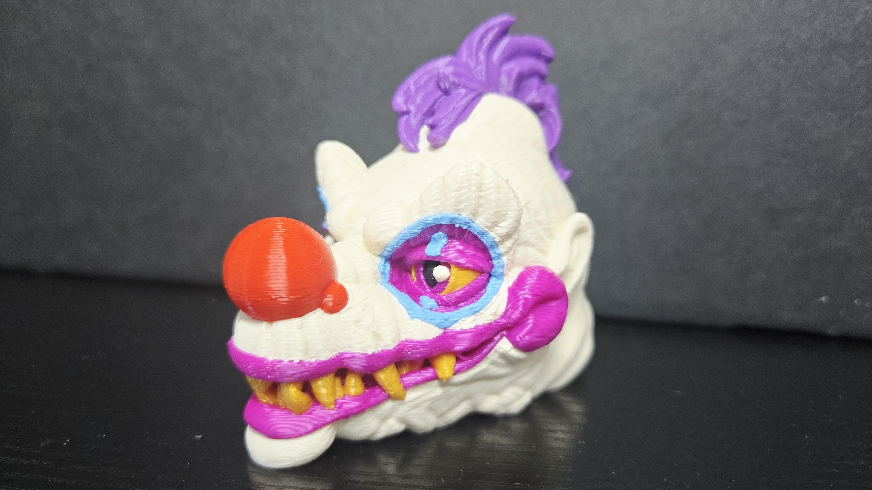 Side view of the alternate head sculpt showing the detailed monster features
