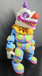 Three-quarter view of the Klownzilla flexi figure highlighting his poseable limbs and jointed segments