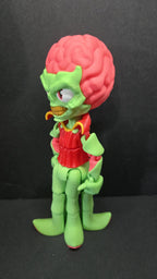 Left side profile view of the flexible Mars Attacks alien toy showing the head curvature and arm articulation joints