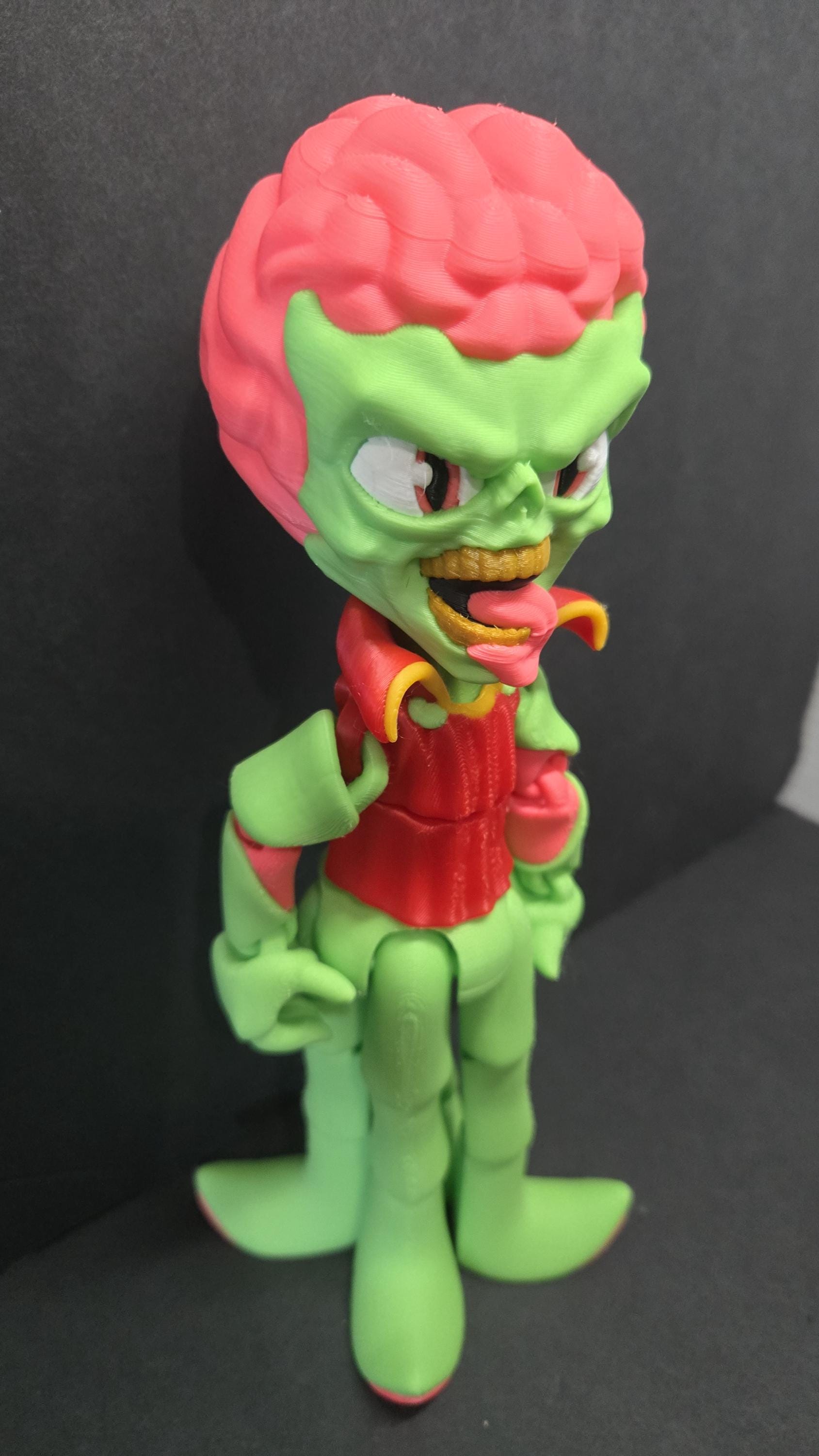 Right side view of the jointed Martian figure slightly flexed to demonstrate the dynamic movement of the arm and leg segments