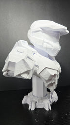 Three-quarter right side view of the unpainted Master Chief bust showcasing the angular helmet visor and shoulder armor plates