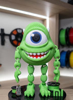 Full-color 3D printed Monsters Inc Mike Wazowski flexi figure standing upright on a flat surface showing a complete front view