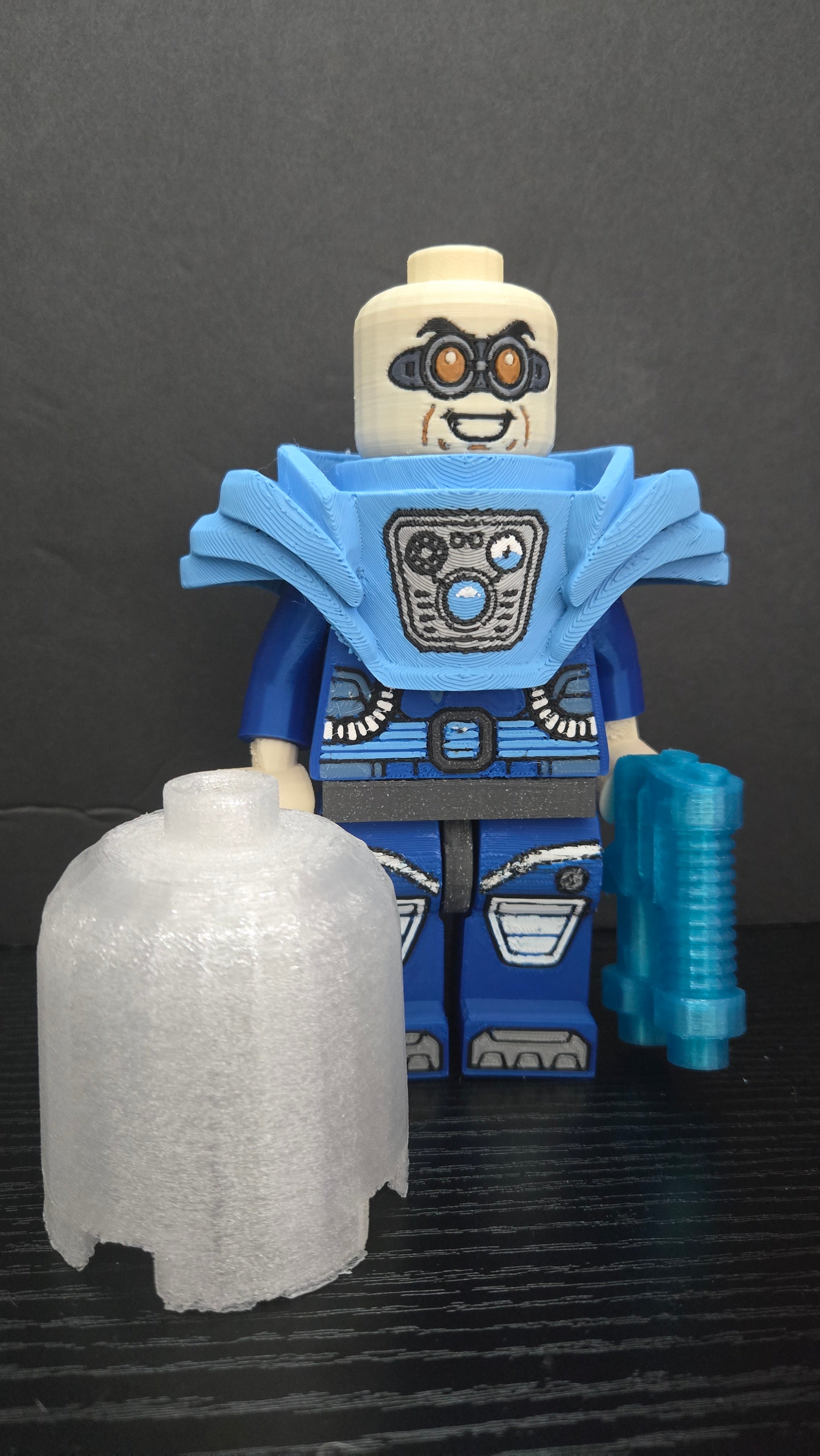 Oversized Mr. Freeze brick megafig standing with his freeze gun and translucent dome helmet set in front