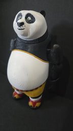 Left side profile view of the flexible Po toy showing the round stance profile and arm articulation joints