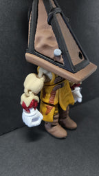 Three-quarter right side view of the flexible Pyramid Head figure showcasing the helmet shape, arm joints, and apron detail