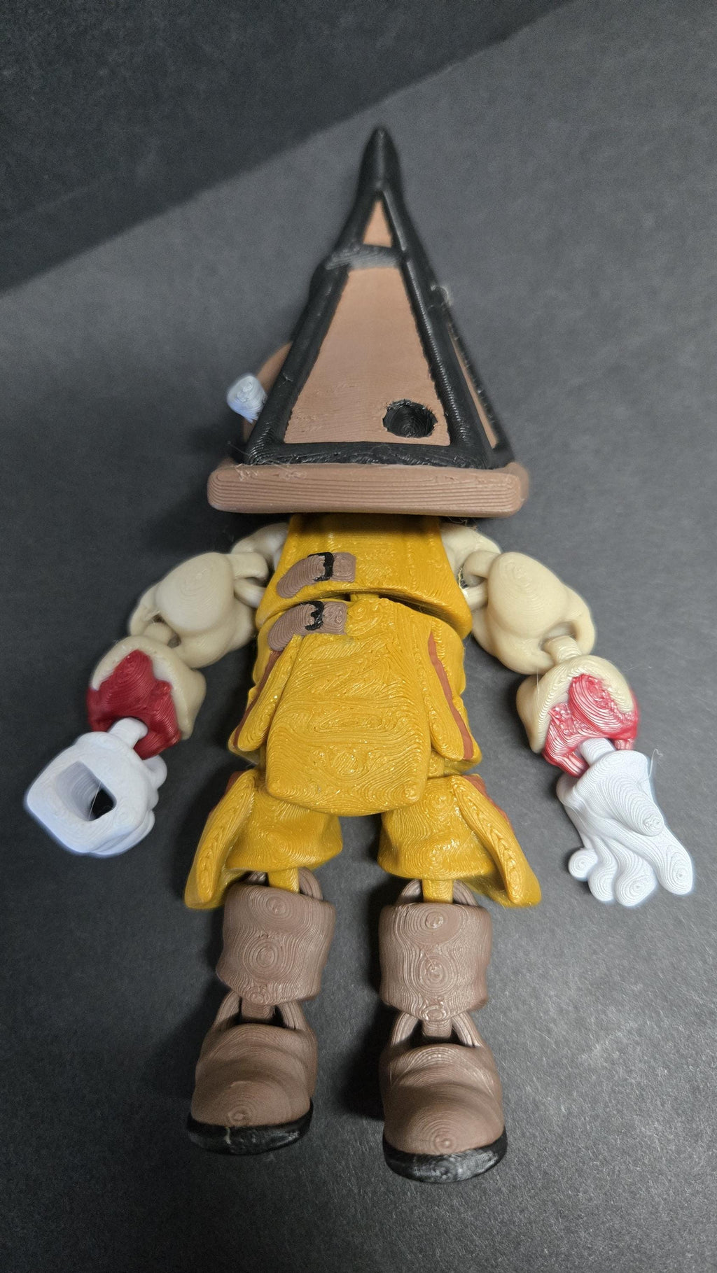 Straight front view of the 3D printed Pyramid Head flexi figure showing the detailed helmet and weathered gear