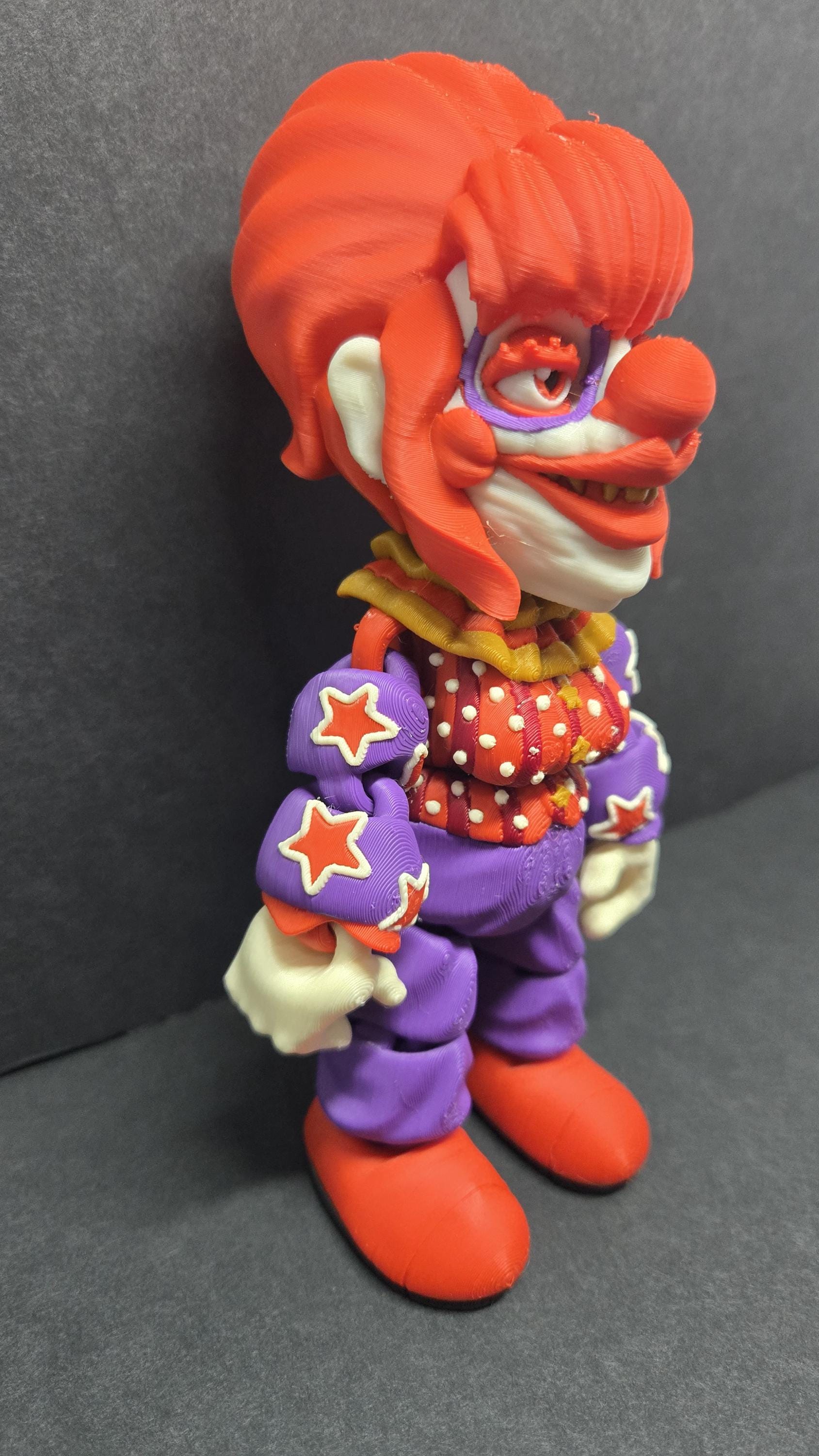 Three-quarter view of the Rosebud flexi figure highlighting his poseable limbs and jointed segments