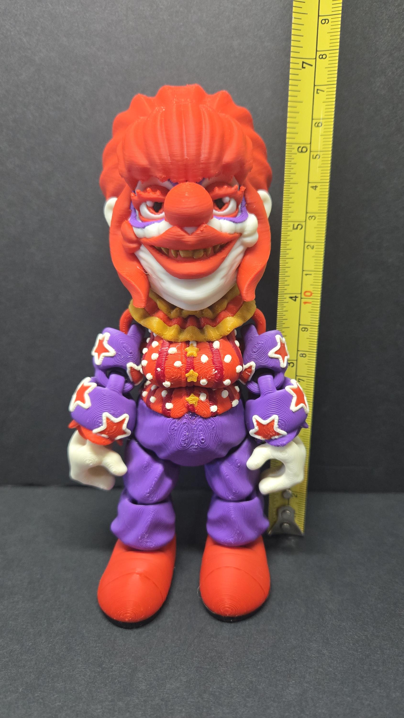 Yellow measuring tape showing the 7-inch height of the 3D printed Rosebud flexi figure