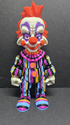 Straight front view of the 3D printed Rudy flexi figure without accessories showcasing his striped suit