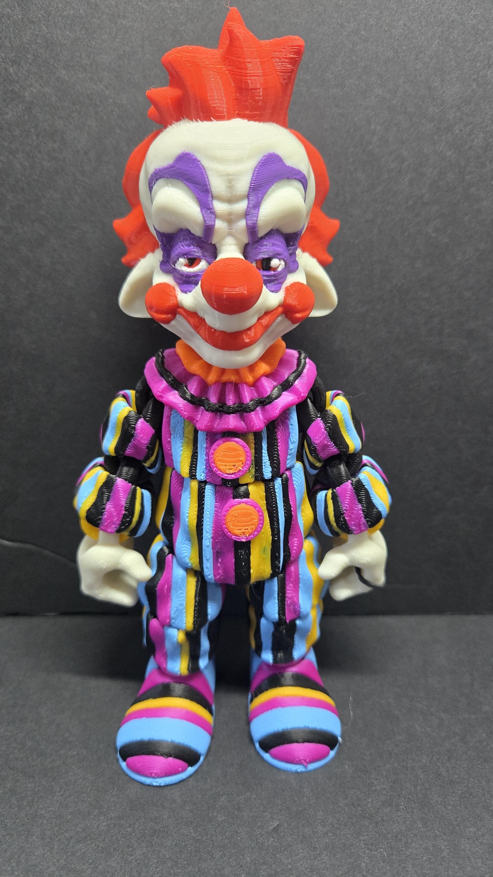 Straight front view of the 3D printed Rudy flexi figure without accessories showcasing his striped suit