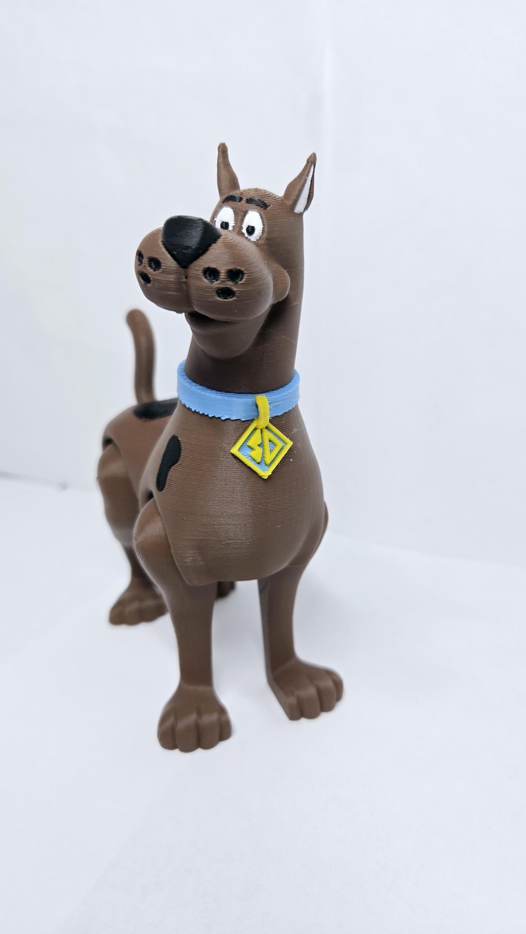 Straight front view of the 3D printed Scooby-Doo flexi figure showing his signature collar and expressive face