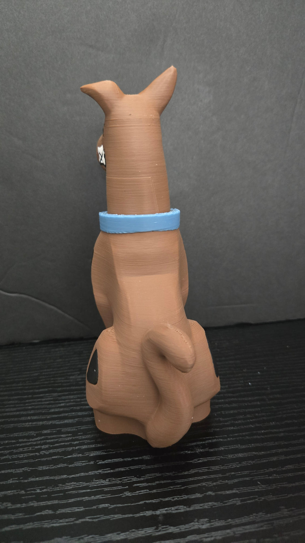 Rear view of the Scooby-Doo brick megafig showing back spots and tail details