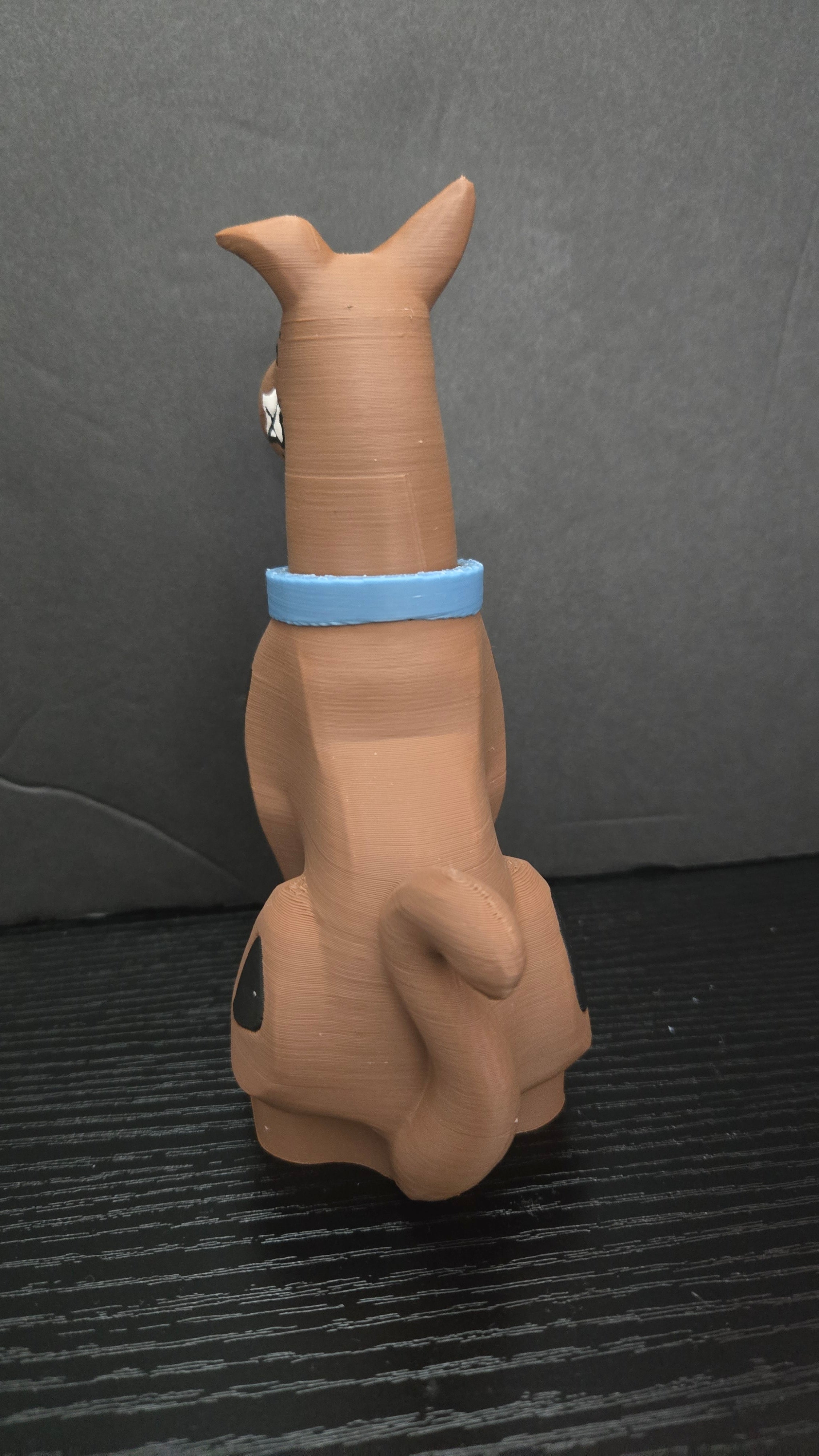 Rear view of the Scooby-Doo brick megafig showing back spots and tail details