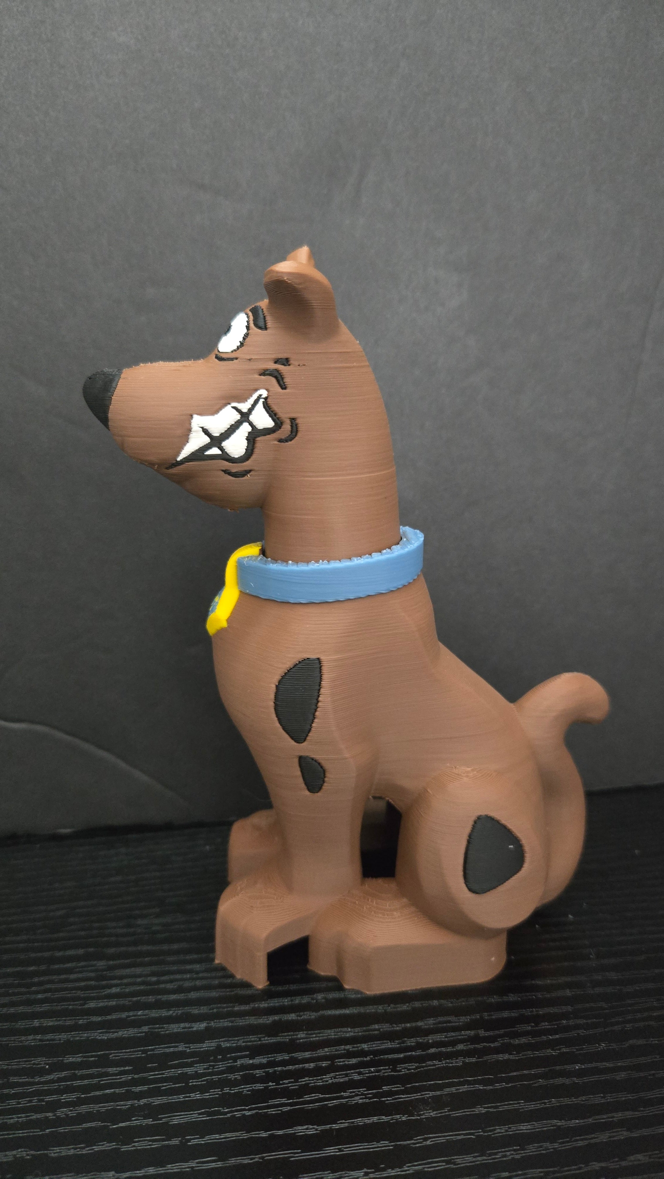Right side profile view of the Scooby-Doo megafig highlighting the body spots and sitting posture
