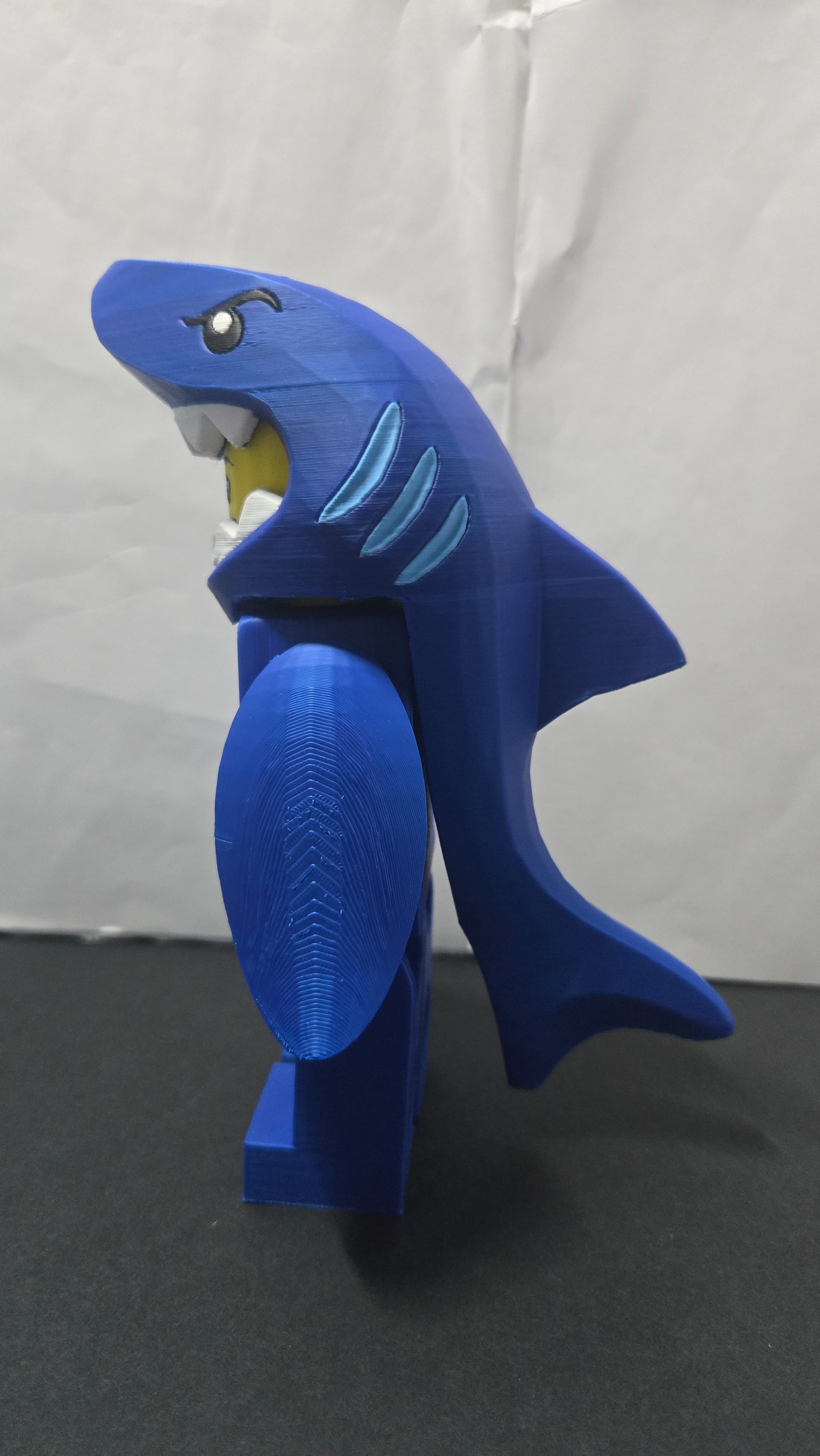 Left side profile view of the 3D printed Shark Suit brick collectible