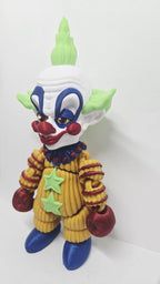 Three-quarter view of the Shorty flexi figure highlighting his poseable limbs and jointed segments