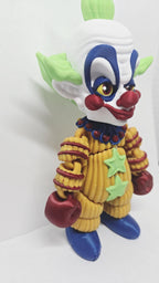 Side profile view of the 3D printed Shorty flexi figure showing his articulation and suit detail