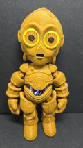 Full-color 3D printed C-3PO flexi figure standing upright on a flat surface showing a complete front view