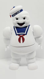 Three-quarter right side view of the flexible Stay Puft figure showcasing the sailor hat, neckerchief, and limb joints