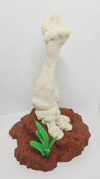 Right side view focusing on the weathered surface cracks and porous details integrated into the 3D printed dinosaur bone model